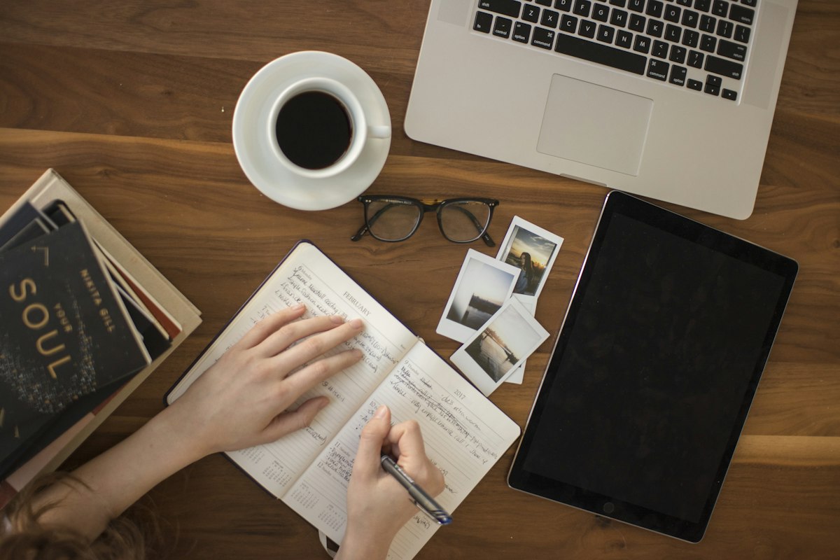 Person writing in a notebook